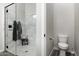 Features a luxurious walk-in shower with marble tile, and a toilet room at 943 E Kortsen Rd # 2, Casa Grande, AZ 85122