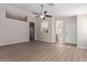 Spacious living room featuring wood flooring, high ceilings, and an open floor plan at 1058 W Swan Dr, Chandler, AZ 85286