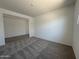 Bright bedroom with carpeted floors, neutral walls and lots of natural light coming in through a window at 11796 N Vanero Ct, Maricopa, AZ 85139