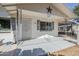 Charming single story home featuring a covered front porch with decorative railings and a star accent at 120 S Olive --, Mesa, AZ 85204