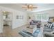 Inviting living room featuring comfortable seating, ample natural light, and access to the kitchen, creating a cozy atmosphere at 120 S Olive --, Mesa, AZ 85204