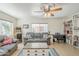 Bright living room featuring two sofas, a game machine, and plenty of natural light at 120 S Olive --, Mesa, AZ 85204