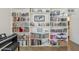 Close-up of the built-in shelving in the living room, filled with books and decorative items at 120 S Olive --, Mesa, AZ 85204