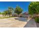 This beautiful backyard features a basketball court and seating area at 1217 W Fever Tree Ave, San Tan Valley, AZ 85140