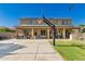 This home features a large backyard with a basketball court and covered patio at 1217 W Fever Tree Ave, San Tan Valley, AZ 85140