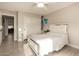 Bright bedroom with a mirrored bed frame, closet, and well-lit interiors for a comfortable space at 1217 W Fever Tree Ave, San Tan Valley, AZ 85140