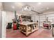 A well-organized garage with ample storage and workspace at 1217 W Fever Tree Ave, San Tan Valley, AZ 85140