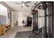 A dedicated home gym with modern fitness equipment, a ceiling fan and plenty of workout space at 1217 W Fever Tree Ave, San Tan Valley, AZ 85140