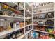 Walk-in pantry with organized shelving, ample storage for groceries, and easy access to supplies at 1217 W Fever Tree Ave, San Tan Valley, AZ 85140