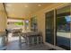 Covered patio with built-in lighting, perfect for outdoor dining and relaxation at 1217 W Fever Tree Ave, San Tan Valley, AZ 85140