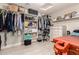 Large walk-in closet with ample shelving, hanging racks, and organized storage solutions at 1217 W Fever Tree Ave, San Tan Valley, AZ 85140