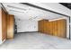 Spacious garage with ample storage cabinets and an overhead door at 12271 N 74Th St, Scottsdale, AZ 85260