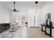 Bright living room with high ceilings, modern furnishings, and lots of natural light at 12271 N 74Th St, Scottsdale, AZ 85260