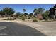 Neighborhood park featuring lush landscaping, walking paths, and a gazebo at 1228 W Snowbell Ave, Queen Creek, AZ 85140