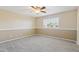 Bedroom with neutral walls, carpet, and window at 12748 N 57Th Dr, Glendale, AZ 85304