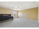 Bedroom with a queen bed and carpet flooring at 12748 N 57Th Dr, Glendale, AZ 85304