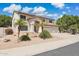 Charming two-story home with a three-car garage and desert landscaping at 12748 N 57Th Dr, Glendale, AZ 85304