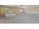 Large living room features two ceiling fans, plush carpeting and plenty of natural light at 12748 N 57Th Dr, Glendale, AZ 85304