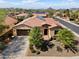 Bird's eye view of home with tile roof, desert landscaping, and convenient driveway at 12904 W Dale Ln, Peoria, AZ 85383