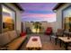 Inviting outdoor patio with comfortable seating, perfect for evening relaxation and entertaining at 12904 W Dale Ln, Peoria, AZ 85383