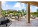 Patio featuring comfortable seating and a view of the professionally landscaped backyard at 12904 W Dale Ln, Peoria, AZ 85383