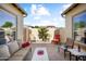 Relaxing patio area with comfortable seating and views of the landscaped backyard at 12904 W Dale Ln, Peoria, AZ 85383