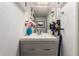 Cozy bathroom featuring a modern vanity with a white countertop and a vase with flower accents at 1401 E Puget Ave # 4, Phoenix, AZ 85020