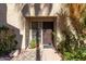 Charming front door with a security screen and a decorative window with plants adorning the entrance at 1401 E Puget Ave # 4, Phoenix, AZ 85020