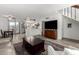 Spacious living area with an open floor plan connecting the living room and bright modern kitchen at 1401 E Puget Ave # 4, Phoenix, AZ 85020