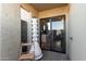 Outdoor patio area with unique decor, privacy, and a sliding glass door entrance at 1401 E Puget Ave # 4, Phoenix, AZ 85020