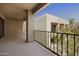 Relax on this spacious balcony and enjoy the surrounding landscape views, protected by a wrought iron railing at 14910 N Kings Way # 206, Fountain Hills, AZ 85268