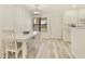 Bright dining area with clean lines, neutral decor, and a view of the exterior, perfect for cozy meals at 14910 N Kings Way # 206, Fountain Hills, AZ 85268