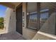 Inviting entryway featuring a security door, 'Welcome to Our Home' sign, and a view of the community at 14910 N Kings Way # 206, Fountain Hills, AZ 85268
