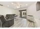 Bright living room with modern furnishings, a balcony view, and neutral-colored decor at 14910 N Kings Way # 206, Fountain Hills, AZ 85268