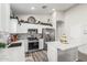 Modern kitchen with stainless steel appliances, white countertops and cabinets, and a functional center island at 16242 W Maui Ln, Surprise, AZ 85379