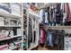 Walk-in closet with custom shelving and ample storage space at 16365 N 138Th Ave, Surprise, AZ 85374