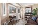 Inviting home office with a desk, comfortable seating, and ample natural light at 16365 N 138Th Ave, Surprise, AZ 85374