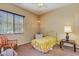 Serene bedroom with a window and neutral color scheme at 16758 W Apache St, Goodyear, AZ 85338