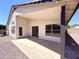Covered back patio with concrete flooring, perfect for outdoor living and entertaining at 1679 E Oakland St, Gilbert, AZ 85295