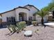 Inviting single-story home with desert landscaping and a covered entryway at 1679 E Oakland St, Gilbert, AZ 85295