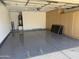 Well-kept garage with epoxy flooring and built-in storage cabinets at 1679 E Oakland St, Gilbert, AZ 85295