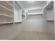 Spacious walk-in closet with ample shelving and hanging space at 1679 E Oakland St, Gilbert, AZ 85295