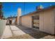 Backyard featuring a pool, patio area, and sliding glass doors for easy indoor/outdoor living at 17244 N 36Th Ln, Glendale, AZ 85308