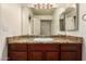 Bathroom featuring a vanity with a sink, a mirror, and recessed lights above at 17244 N 36Th Ln, Glendale, AZ 85308