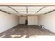 Spacious garage featuring ample storage and an installed water heater at 17244 N 36Th Ln, Glendale, AZ 85308