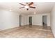 Living room featuring neutral walls, tile floors, ceiling fan and recessed lighting at 17244 N 36Th Ln, Glendale, AZ 85308