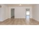 Open space showcasing neutral paint, tile floors and multiple doorways at 17244 N 36Th Ln, Glendale, AZ 85308