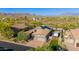 Aerial view of a home with solar panels, a well-manicured yard, and desert landscaping at 1753 N Berrett --, Mesa, AZ 85207