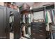 Spacious walk-in closet with custom shelving, drawers, and ample storage for clothing and accessories at 1753 N Berrett --, Mesa, AZ 85207