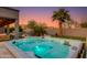 Inviting hot tub with turquoise water and palm tree with mountain views in the private backyard oasis at 1753 N Berrett --, Mesa, AZ 85207